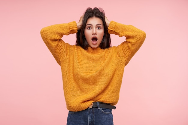 Free Photo Amazed Young Attractive Brunette Woman Dressed In Yellow