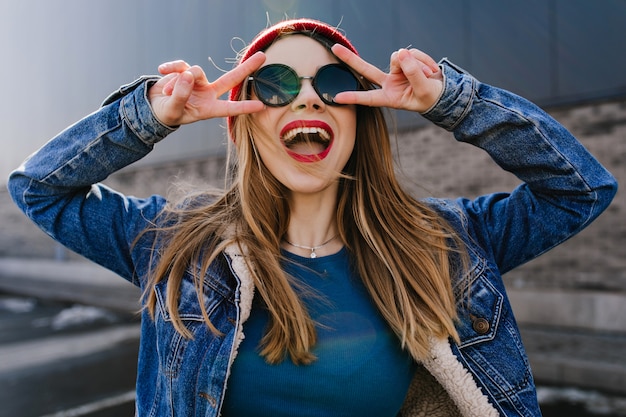 Free Photo | Amazing young lady in trendy attire laughing and making ...