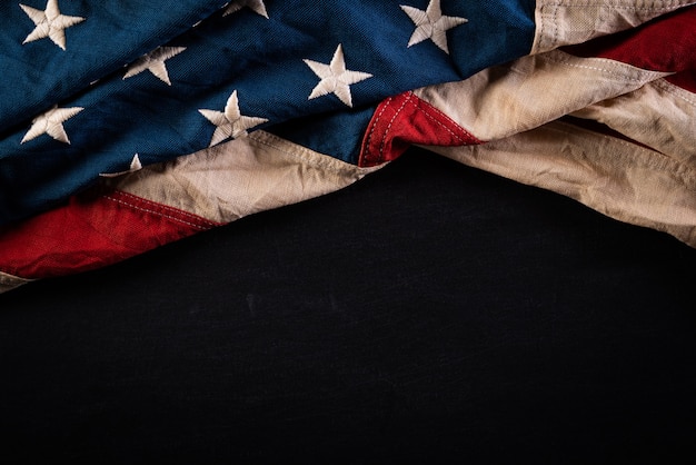 Premium Photo | American flags against a blackboard