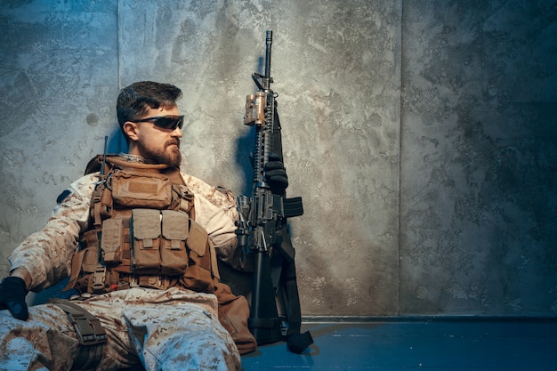American Private Military Contractor Holding Rifle Image On A Dark
