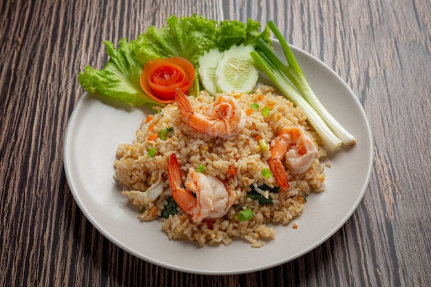 American shrimp fried rice served with chili fish sauce thai food. Free Photo