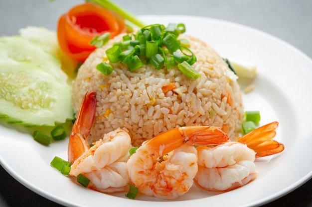 American shrimp fried rice served with chili fish sauce thai food. Free Photo
