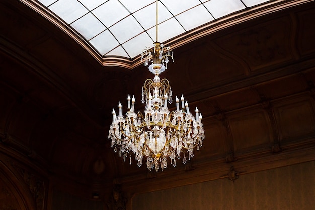 Ancient chandelier in the hall of the house of scientists Premium Photo