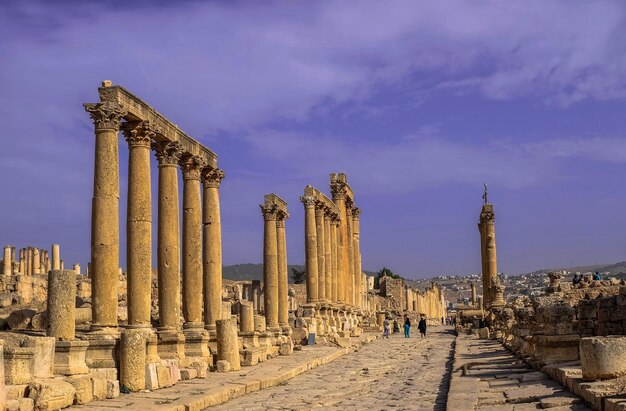 Premium Photo | Ancient roman ruins walkway along the columns in jerash ...