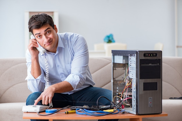 Angry customer trying to repair computer with phone support Premium Photo