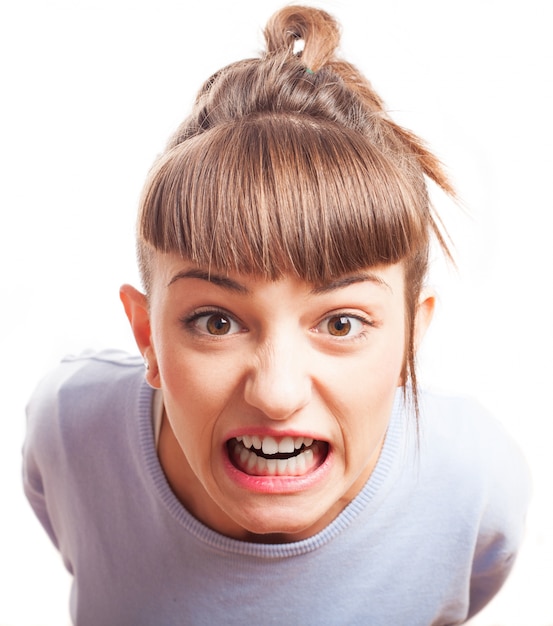 Angry girl showing her teeth Photo | Free Download