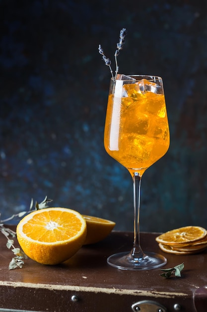 Premium Photo | Aperol spritz cocktail in glass on dark background