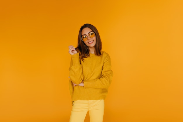 Free Photo | Appealing girl in yellow pants smiling. gorgeous caucasian ...