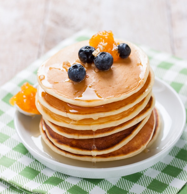 Free Photo | Appetizing pancakes with honey and marmalade