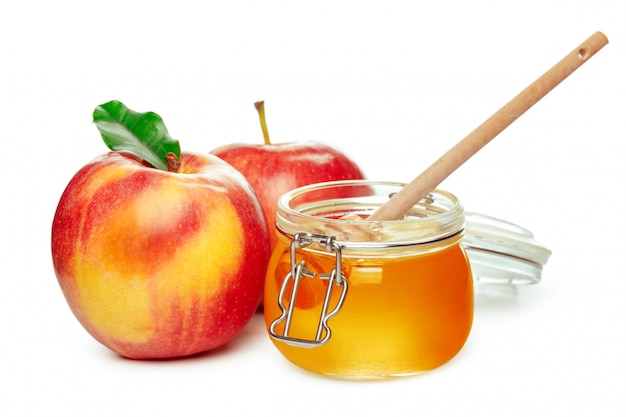 Premium Photo | Apples and honey jar for jewish new year holiday isolated