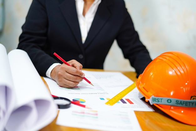 Architect or engineer working project with tools in office Premium Photo