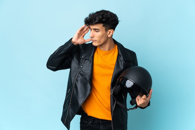 Premium Photo | Argentinian man with a motorcycle helmet with headache
