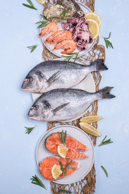 Premium Photo | Arrangement of fresh uncooked seafood fish