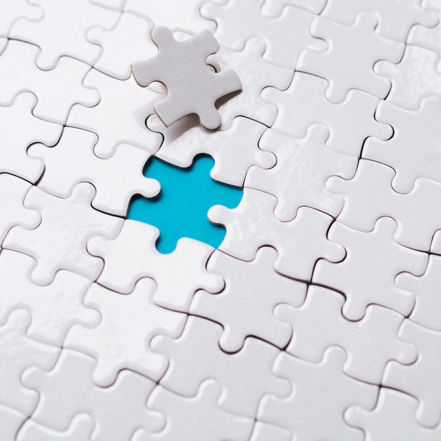 Free Photo | Arrangement of puzzle pieces for individuality concept