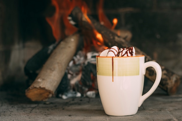 Free Photo | Arrangement with mug near the fireplace