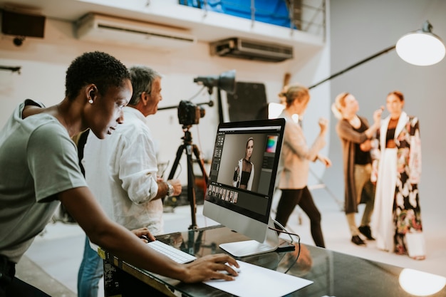 premium-photo-art-director-checking-photos-on-a-monitor