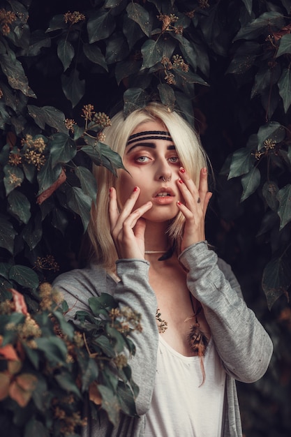 Premium Photo Art Portrait Of Beautiful Lonely Albino Girl Pretty Woman Posing In Park In Red Leaves And Looking At You