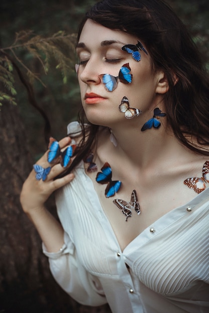 Premium Photo Art Portrait Of Naked Woman With Blue Butterflies