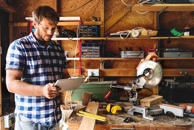 Premium Photo | Artisan working with wood