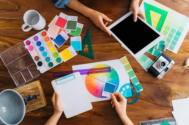 Premium Photo | Artists working at desk