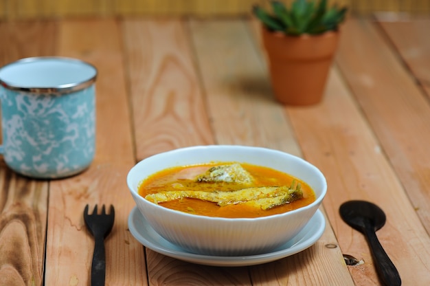 Premium Photo Asam Pedas Or Translated As Spicy Hot Sour Curry Nornally Cooked With Fish Popular In Malaysia