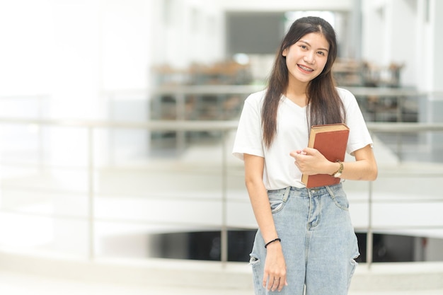 Premium Photo | Asian adolescent woman college student in relaxed ...