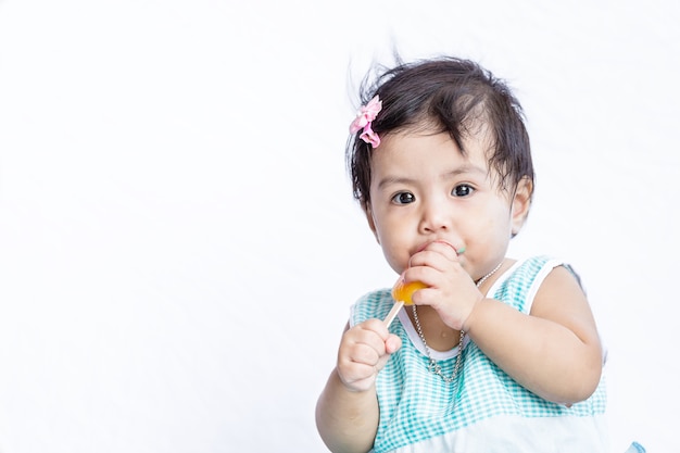 Premium Photo | Asian baby eating ice cream after she stop crying