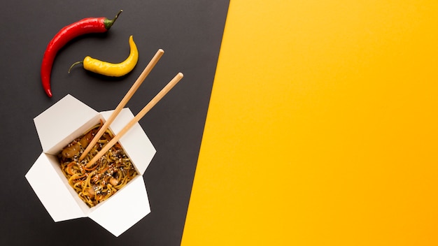 Download Free Photo Asian Food Box With Yellow Background PSD Mockup Templates