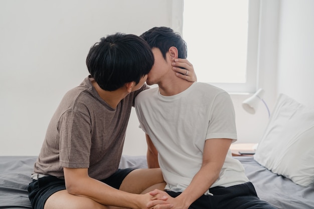 Asian Gay Couple Kissing On Bed At Home Young Asian Lgbtq Men Happy