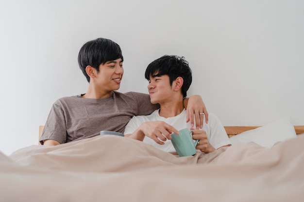 Asian Gay Men Couple Talking Having A Great Time At Modern
