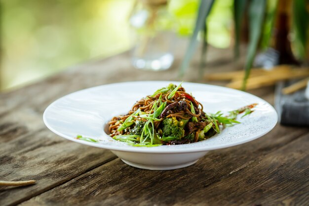 Premium Photo | Asian gourmet wok soba noodles with vegetables