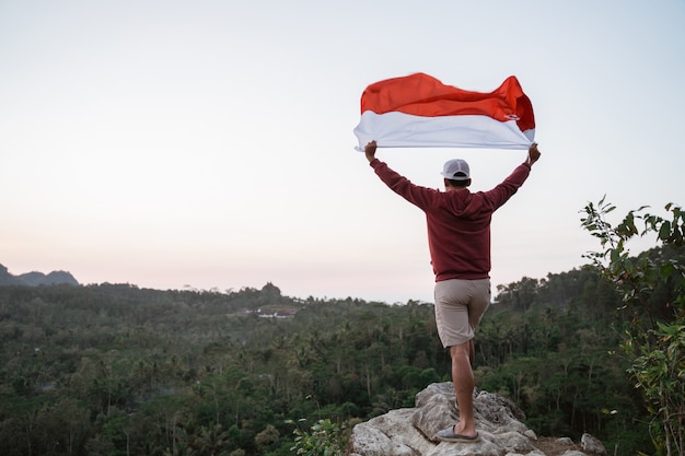 Premium Photo | Asian male with indonesian flag celebrating ...