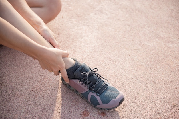 Premium Photo | The asian man use hands hold on his ankle while running ...