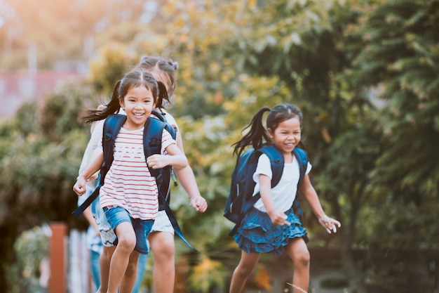 kid running with backpack