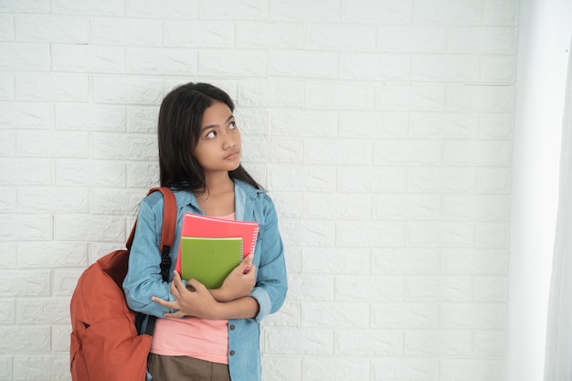 Asian Teen Student Looking Up Premium Photo