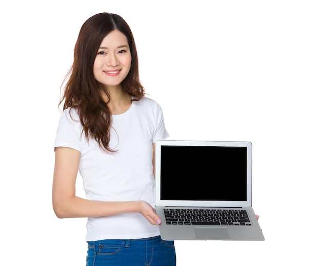 Premium Photo | Asian woman showing blank screen of laptop computer