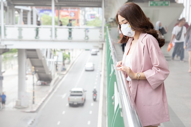 Download Free Asian Woman Wearing A Protective Face Mask For Plague Coronavirus Use our free logo maker to create a logo and build your brand. Put your logo on business cards, promotional products, or your website for brand visibility.