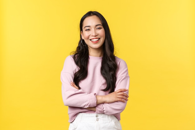 Premium Photo | Asian woman on yellow background.