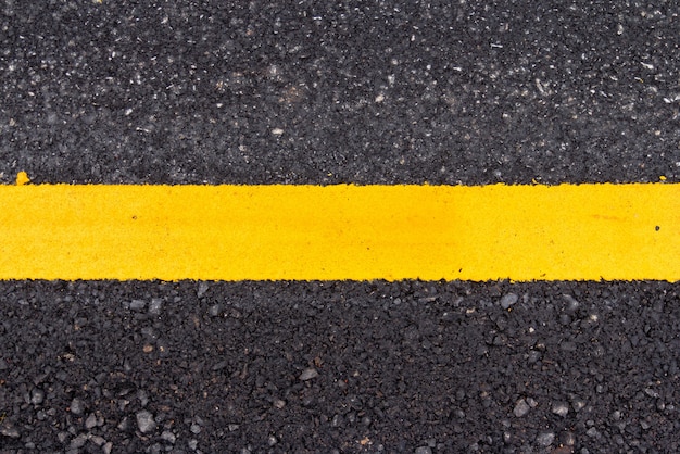 Premium Photo | Asphalt road surface with yellow line