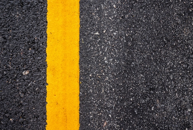 Premium Photo | Asphalt road surface with yellow line