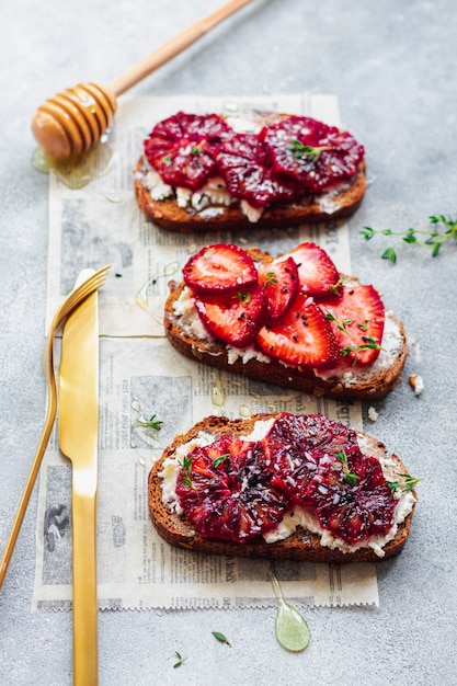 Premium Photo | Assorted bruschetta with whole grain bread, cottage ...