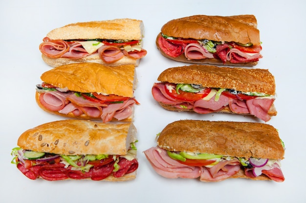 Premium Photo | Assorted delicious baguette sandwiches.