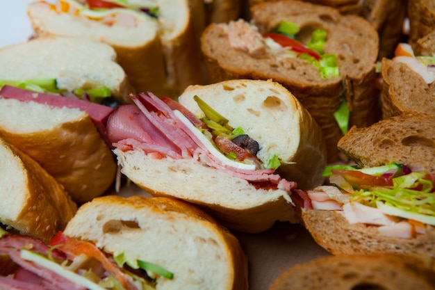 Premium Photo | Assorted delicious baguette sandwiches.