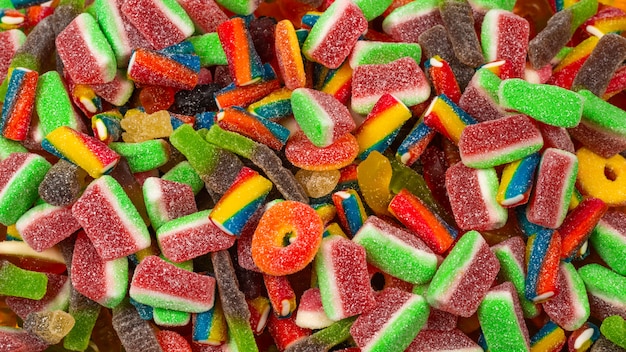 Assorted gummy candies background | Premium Photo