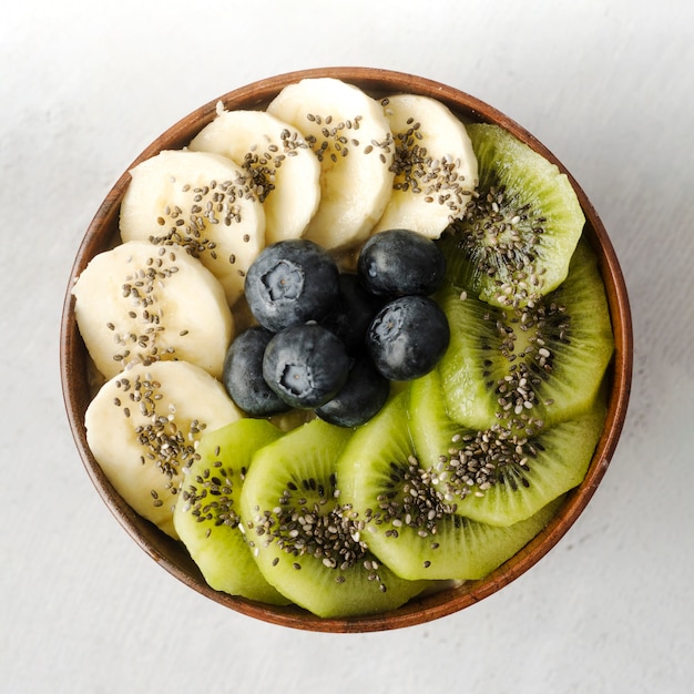 Assortment of fruit in bowl top view | Free Photo