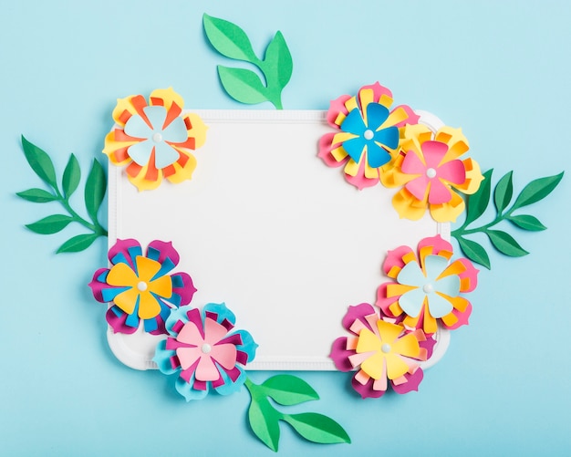 Free Photo | Assortment of multicolored paper spring flowers on whiteboard