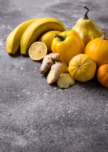 Assortment of yellow fruits and vegetables | Premium Photo