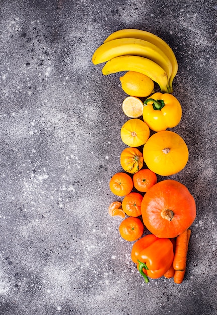 Premium Photo | Assortment of yellow and orange fruits and vegetables