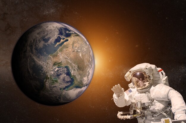 Premium Photo | Astronaut in outer space on of the earth