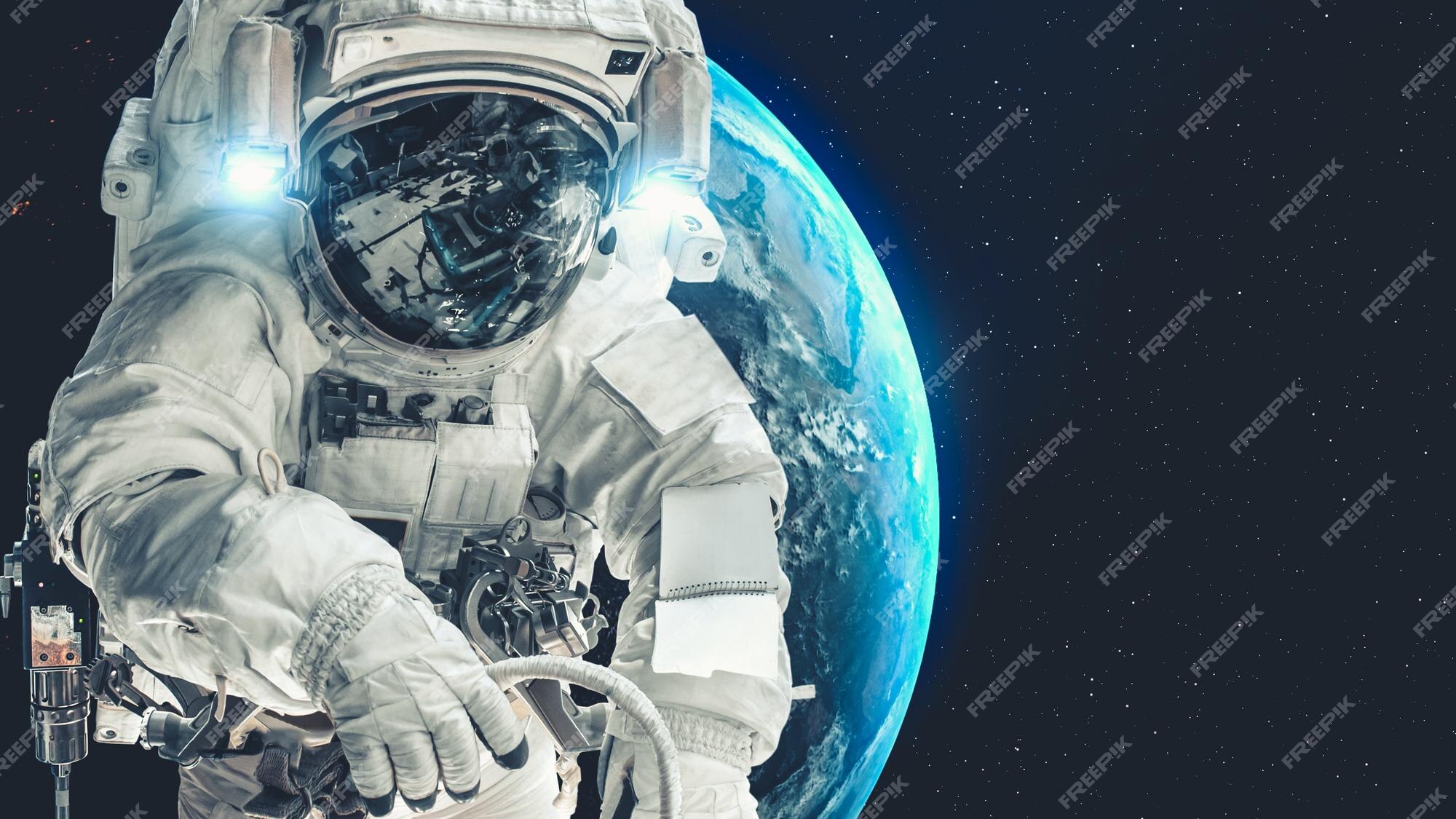 Premium Photo Astronaut Spaceman Do Spacewalk While Working For